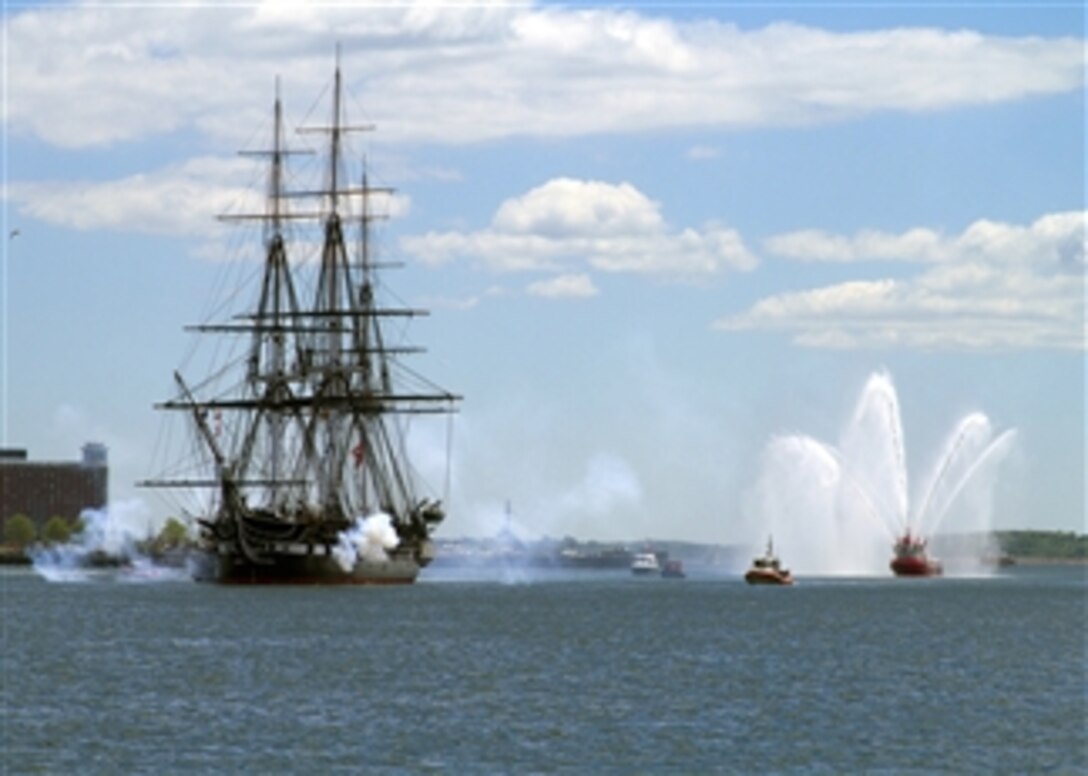 The USS Constitution fires a 17-gun salute during the ship's first turnaround cruise of the year in Boston Harbor on June 4, 2013.  The cruise commemorated the 71st anniversary of the Battle of Midway and also recognized first responders of the Boston Marathon bombings.  More than 300 first responders representing the Boston and state police, medical personnel and the Boston Fire Department were invited to participate in the underway commemoration.  