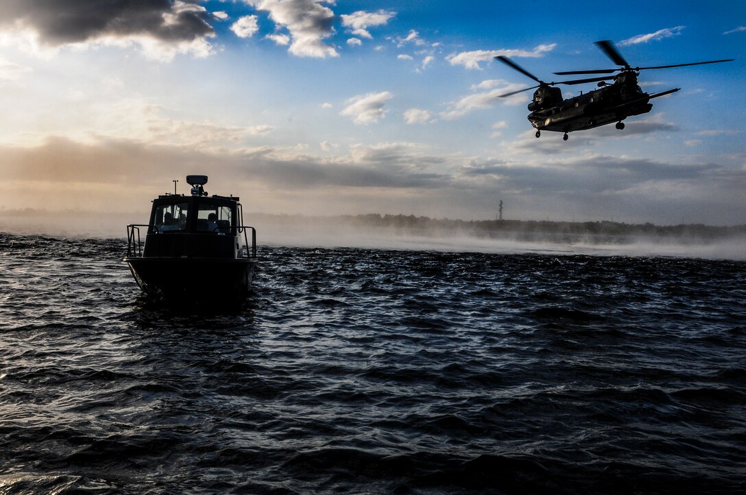 Airmen with 23rd Special Tactics Squadron and Soldiers with 160th Special Operations Aviation Regiment (Airborne) team up for personnel recovery training utilizing alternate infiltration and exfiltration training, on Wynnehaven Beach, Florida, April 9, 2013 (U.S. Air Force/Christopher Callaway)