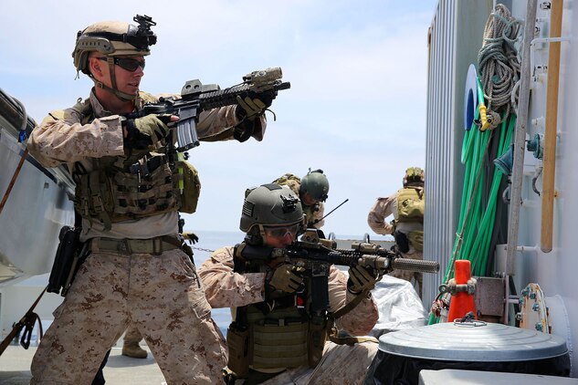 Members of 1st Marine Special Operations Battalion practice boarding and searching ships. Marines train for Visit, Board, Search and Seizure (VBSS) at the highest level. This type of interdiction involves a non-compliant ship, underway, and opposed.