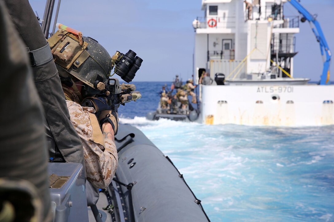 Members of 1st Marine Special Operations Battalion practice boarding and searching ships. Marines train for Visit, Board, Search and Seizure (VBSS) at the highest level. This type of interdiction involves a non-compliant ship, underway, and opposed.