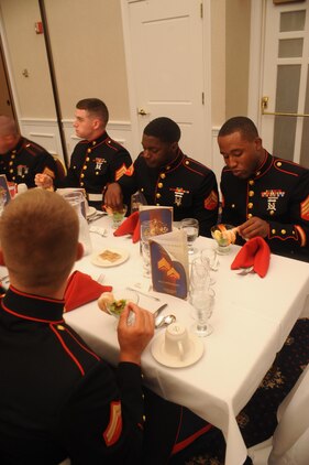 Headquarters Company Marines eat the first course during the non-commissioned officers Mess Night dinner aboard Marine Corps Base Quantico on June 5, 2013. Over forty Marines attended the commemorative event.