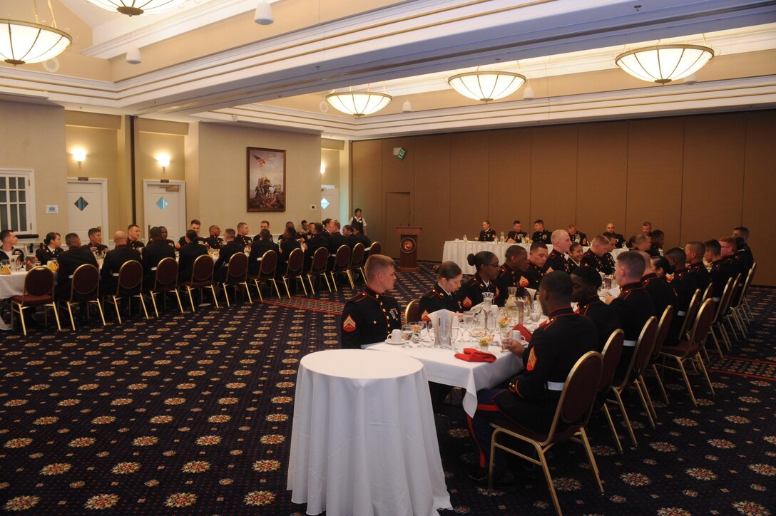 Headquarters Company Marines eat the first course during the non-commissioned officers Mess Night dinner aboard Marine Corps Base Quantico on June 5, 2013. Over forty Marines attended the commemorative event.