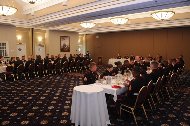 Headquarters Company Marines eat the first course during the non-commissioned officers Mess Night dinner aboard Marine Corps Base Quantico on June 5, 2013. Over forty Marines attended the commemorative event.
