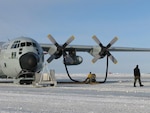 An LC-130 Hercules sits on an improvised ice runway at Davis Station, Antarctica, Nov. 3. A U.S. and Australian medical team moved an injured Australian civilian aboard the aircraft from the camp to a hospital in Hobart, Australia, Nov. 5. The mission was flown as part of Operation Deep Freeze, commanded by U.S. Pacific Command's Joint Task Force Support Forces Antarctica at Hickam Air Force, Hawaii.