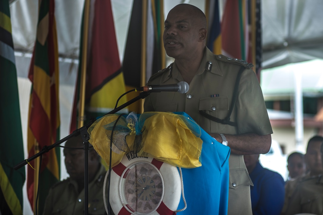 Mr. Vernon Francois, Commissioner of the Royal Saint Lucia Police Force, speaks during the opening ceremony of Tradewinds 2013. Tradewinds 2013 is a joint, combined exercise conducted in conjunction with partner nations to enhance the collective abilities of defense forces and constabularies to counter transnational organized crime and to conduct humanitarian/disaster relief operations. (Official Marine Corps Photo by SSgt. Earnest J. Barnes/Released)