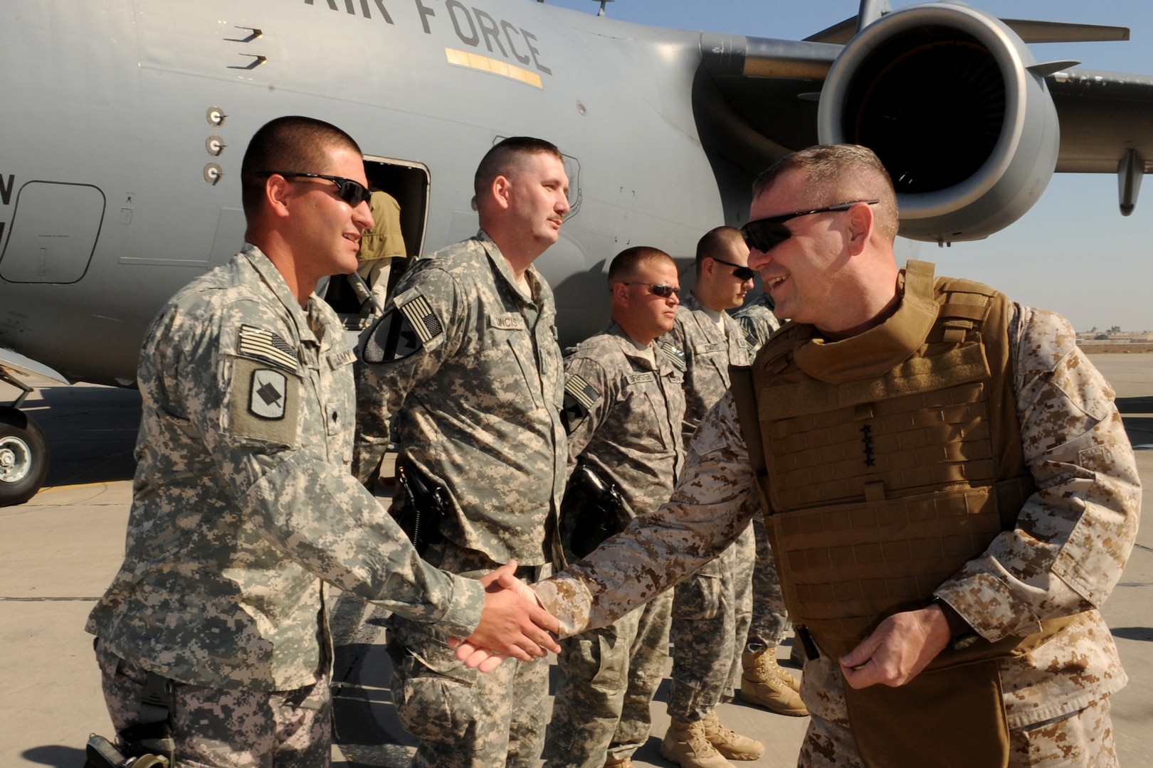 Vice Chairman of the Joint Chiefs of Staff U.S. Marine Gen. James E. Cartwright thanks soldiers from the Arkansas National Guard at Baghdad International Airport, Iraq, Nov. 15, 2008. The Guardsmen provided security for the general during his visit to Iraq.