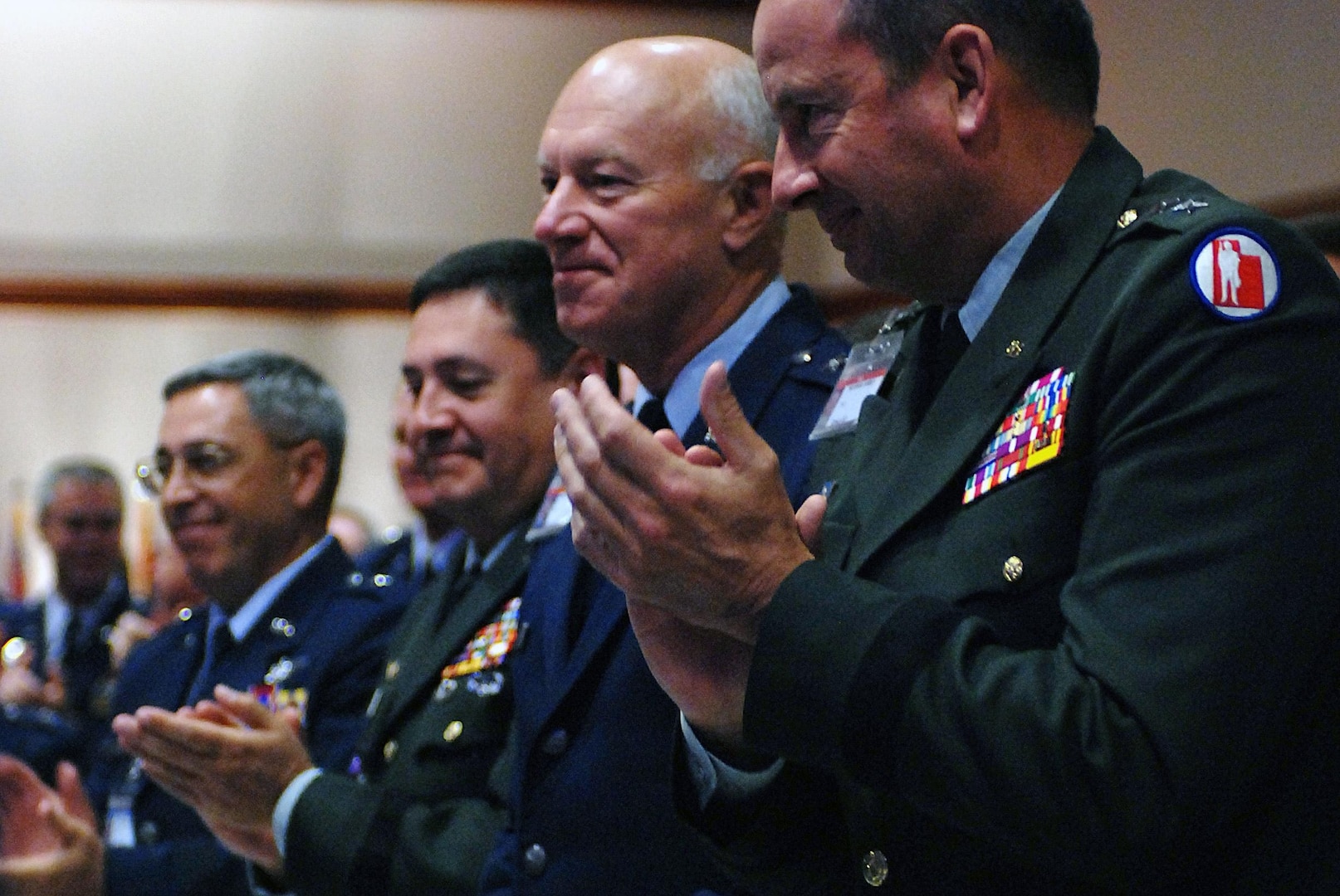 Air Force Maj. Gen. Harry M. Wyatt III, the adjutant general of Oklahoma, is applauded by hundreds of general officers and command chief master sergeants at the Air National Guard's Senior Leadership Conference at the National Conference Center, Nov. 17, outside Washington. Gen. Craig R. McKinley, chief of the National Guard Bureau, announced the selection of Wyatt as the next director of the Air National Guard.