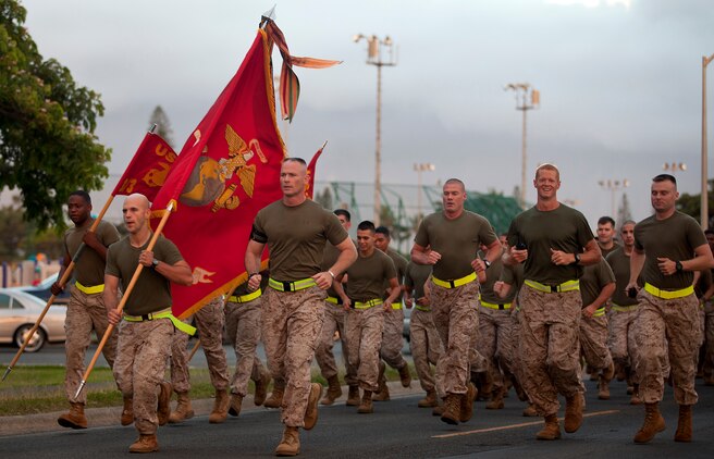 MARINE CORPS BASE HAWAII - Members 3rd Marine Regiment run down Mokapu Road on Marine Corps Base Hawaii to honor fallen heroes from 3rd Marines, June 6. Marines and sailors ran two and a half miles before beginning a ceremony to pay respects to members of 3rd Marines who were killed in Iraq and Afghanistan. (U.S. Marine Corps photo by Lance Cpl. Matthew Bragg)