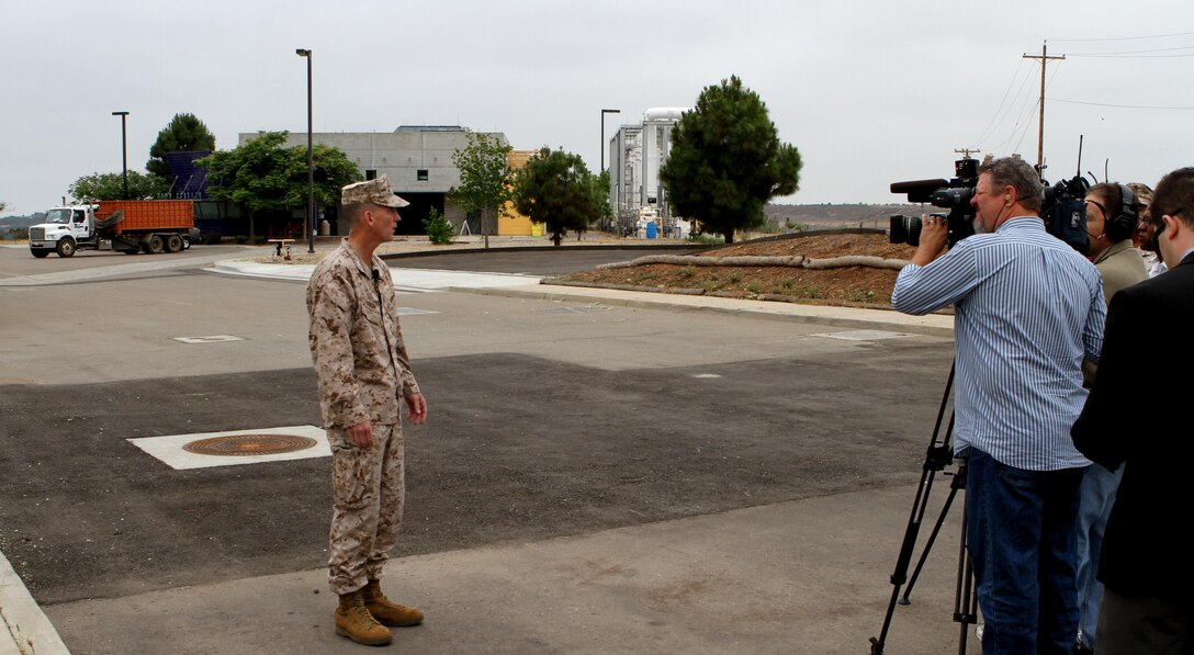 Col. John Farnam, Marine Corps Air Station Miramar, Calif., commanding officer, speaks to media while highlighting the anniversary celebration of the Miramar Landfill generators' first use at the landfill in San Diego, June 7. Farnam related to the media how he felt the air station is doing its part in ensuring its own sufficiency and mission readiness by using renewable energy from the landfill's waste.