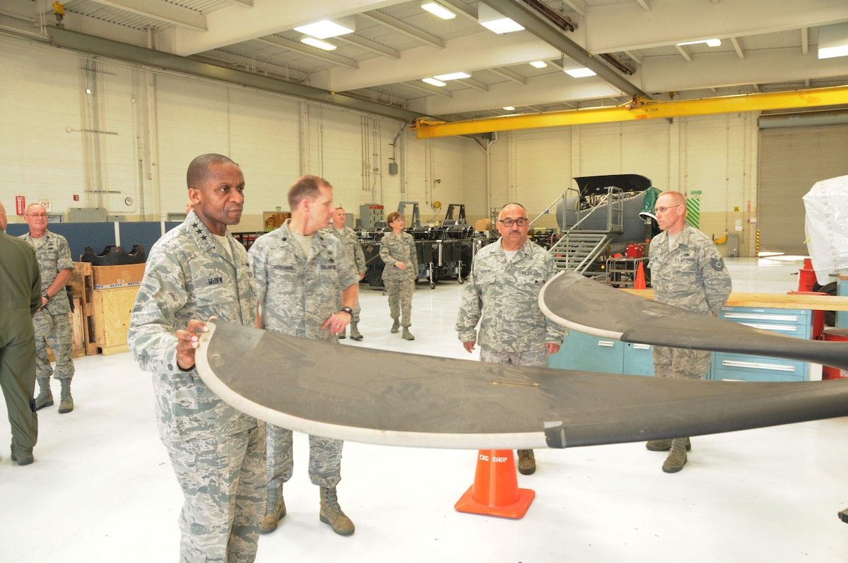 Lt. Gen. Darren McDew commander of the 18th Air Force inspects a propeller of a C-130J in the Propulsion Shop at the 146th Airlift Wing, California Air National Guard on May 11, 2013. Master Sgt. Hermillo Guerrero and Tech. Sgt. David Hopkins give MeDew a briefing on maintenance procedures for the props and engines our aircraft use.  Air National Guard Photo by Master Sgt. Dave Buttner