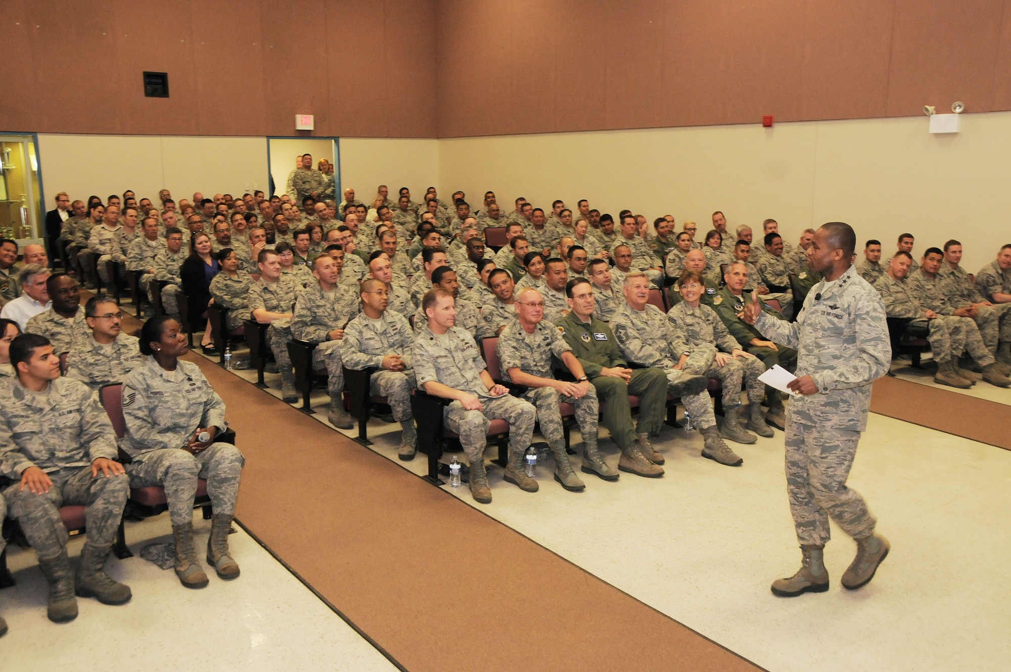 Lt. Gen. Darren McDew commander of the 18th Air Force speaks to an all-hands briefing as part of his tour of facilities and missions at the 146th Airlift Wing of the California Air National Guard on May 11, 2013. McDew spoke of future missions for the unit and addressed members concerns during a question and answer period. He lightened the mood of the crowd a little when he informed them that they will not be able to return their work areas until he was asked at least three good questions, he got more than that. Air National Guard photo by Master Sgt. Dave Buttner