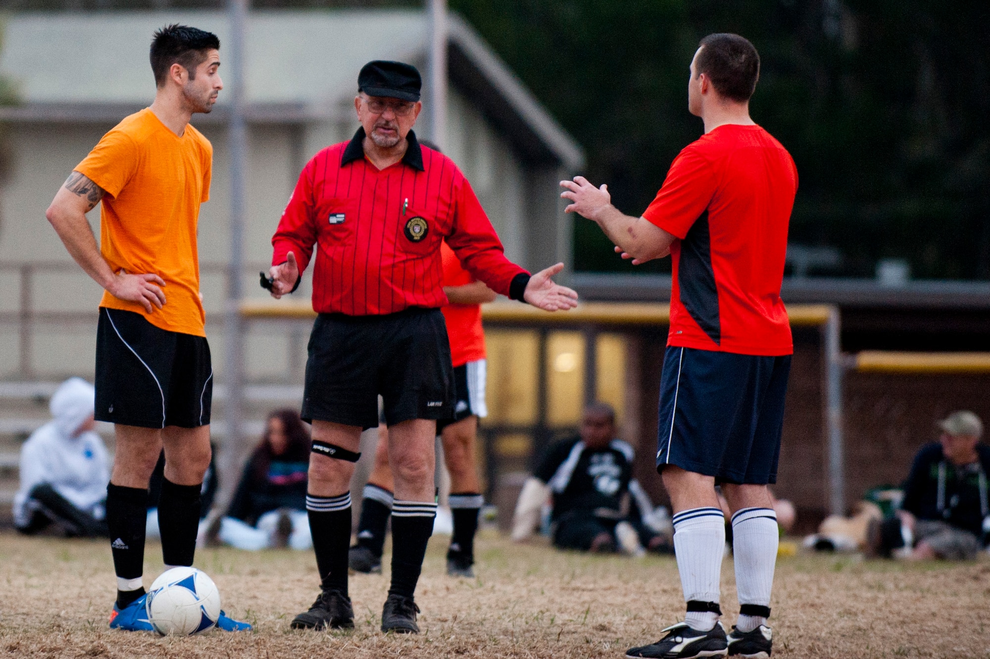 VANDENBERG AIR FORCE BASE, Calif. –Mike Stadnick, retired Air Force captain and referee, reinforces the rules before the second half of play begins during the soccer championship here Thursday, June 6, 2013.  The 14th AF became the soccer champions after defeating the 30th SFS with a final score of 4-1 for the win. (U.S. Air Force photo/Airman Yvonne Morales)