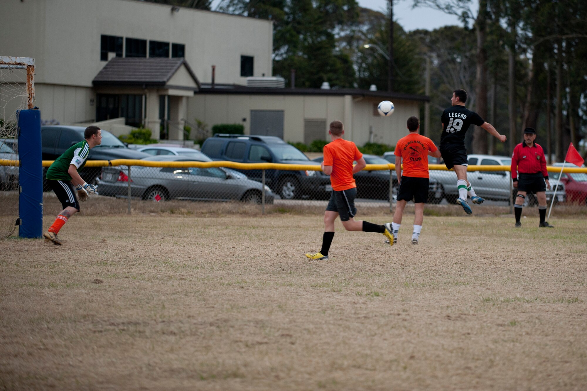 VANDENBERG AIR FORCE BASE, Calif. – Number 19, Airman 1st Class Jessy Luz, 30th Security Forces Squadron response force member, uses his head to direct the ball during a soccer championship here Thursday, June 6, 2013.  The 14th AF became the soccer champions after defeating the 30th SFS with a final score of 4-1 for the win.  (U.S. Air Force photo/Airman Yvonne Morales)