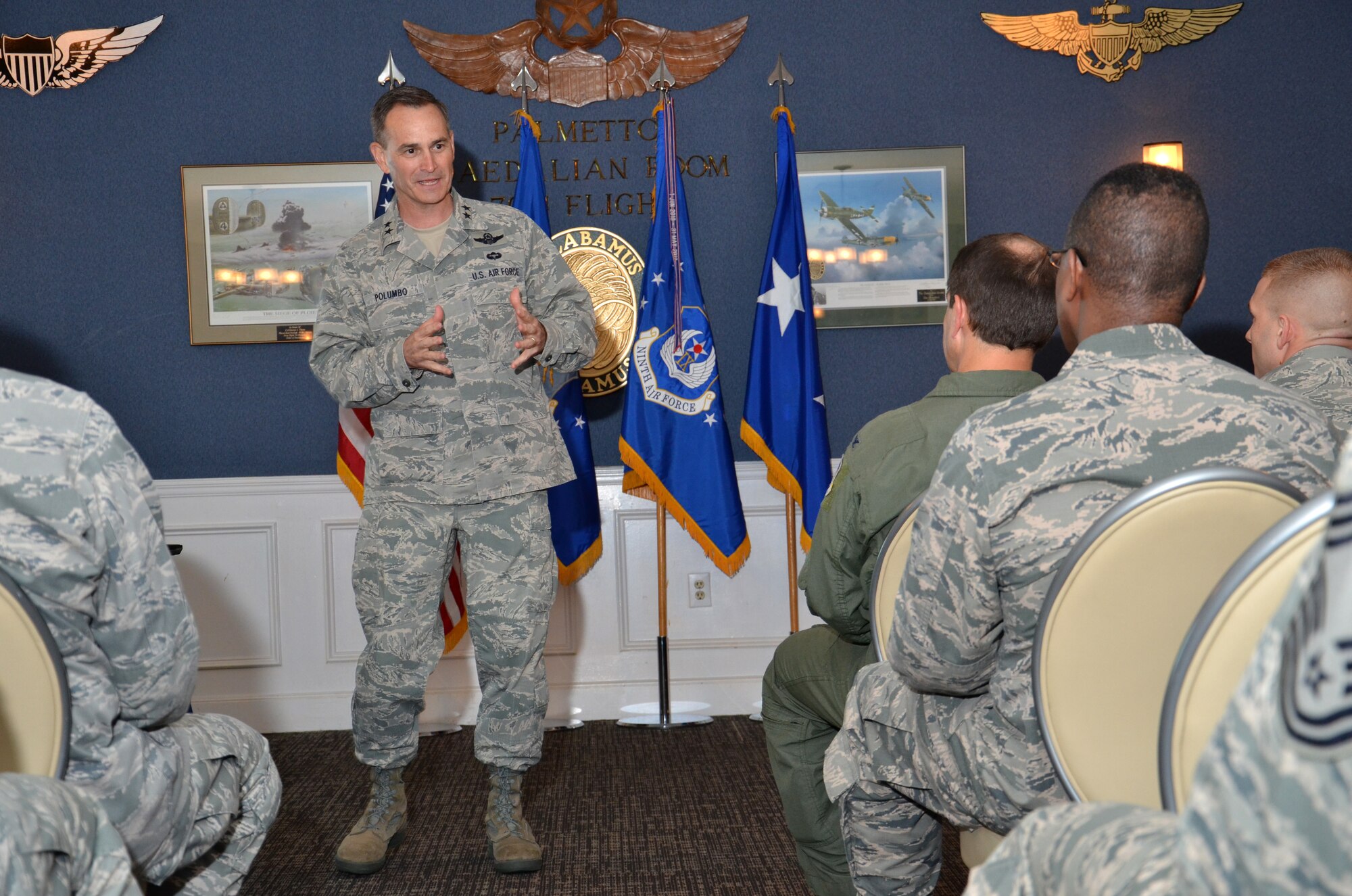 Maj. Gen. Jake Polumbo talks to Ninth Air Force Airmen at the Carolina Skies Club on Shaw Air Force Base, S.C., June 7, 2013 during his first commander’s call as Ninth Air Force leader. He told Airmen; with respect, leadership and positive attitudes, Ninth Air Force will succeed during times of fiscal uncertainty. (U.S. Air Force photo by Staff Sgt. Amanda Currier)