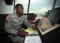 Senior Airman Brian Kelly looks over the air space from the Kelly Field control tower recently. An air traffic controller in the 802nd Operations Support Squadron, Kelly has been accepted into the Leaders Encouraging Airmen Development program at the Air Force Academy Prep School. The program offers enlisted Airmen an opportunity to become an Air Force officer. (U.S. Air Force photo by Robin Cresswell)