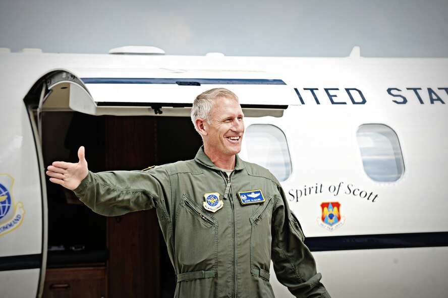 Col. David Almand, 375th Air Mobility Wing commander, arrives at base operations June 6, 2013, after his final mission in the C-21, known as a fini flight. A change of command will be held June 14, whereupon he'll head to Joint Base Andrews, Md., to be the commander for the 89th Airlift Wing. (U.S. Air Force photo/Karen Petitt)