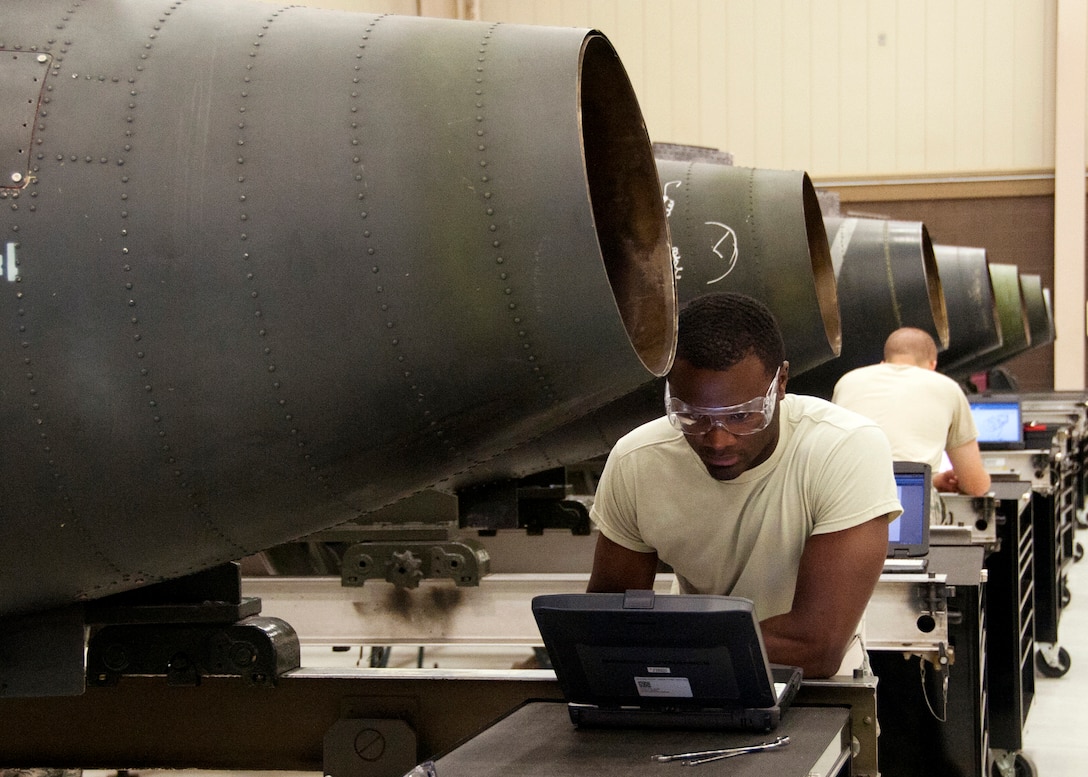U.S. Air Force Airman 1st Class Jeffrey Philistin, 361st Training Squadron, Aerospace Propulsion course, is removing then reinstalling a fuel control for a TF34 engine from an A-10 aircraft on June 04, 2013 at Sheppard Air Force Base, Texas. (U.S. Air Force photo by Frank Carter/Released)