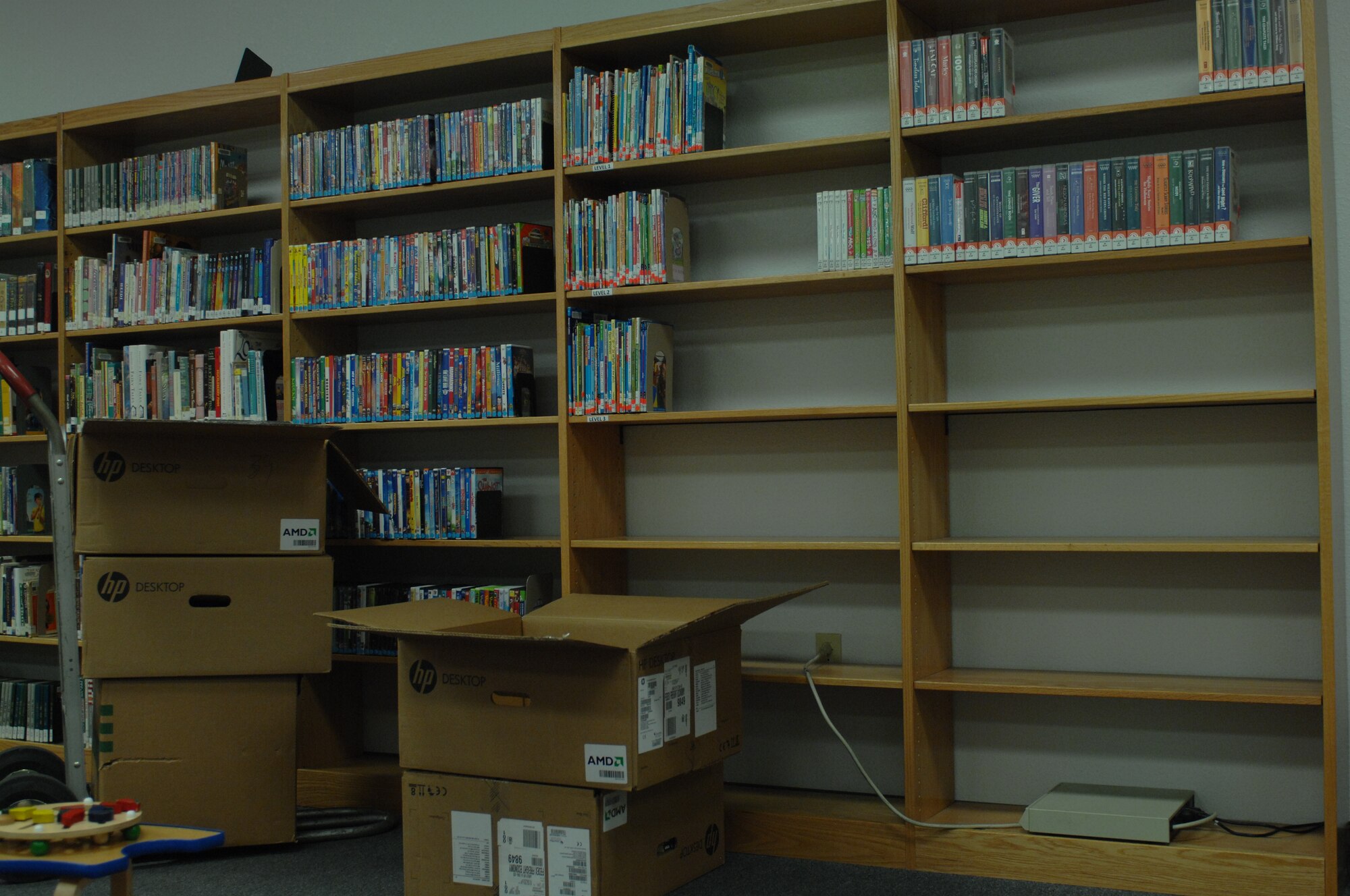 Boxes of books are piled up in the library at Davis-Monthan Air Force Base, Ariz., May 30, 2013. Base leadership decided to close the library for the remainder of fiscal year 2013 due to financial challenges. However, leadership does anticipate re-opening the library. (U.S. Air Force photo by Airman 1st Class Betty R. Chevalier/Released)