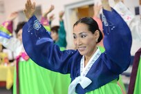 Hyunsook Yongmi Hawkins Park, a dancer with the Korean American Association of San Antonio, performs a traditional Korean dance at the annual Asian-American Pacific Islander Heritage Festival May 30, 2013, at Joint Base San Antonio-Randolph. (U.S. Air Force photo by Ben Faske/Released)
