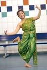 Ratchada Kiewyoi, a dancer with the Korean American Association of San Antonio, performs a traditional Thai dance during the annual Asian-American Pacific Islander Heritage Festival May 30, 2013, at Joint Base San Antonio-Randolph. (US Air Force photo by Benjamin Faske/Released)