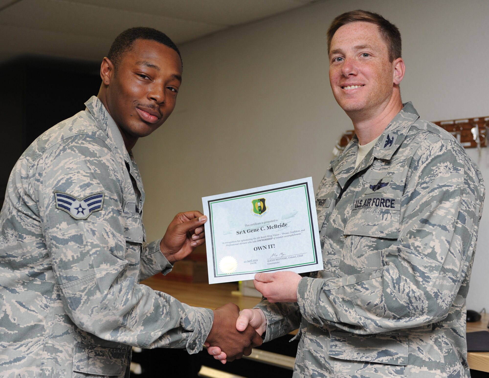 MINOT AIR FORCE BASE, N.D. -- Congratulations to Senior Airman Gene McBride, 705th Munitions Squadron for earning the 5th Bomb Wing Own It Award. McBride has epitomized the 5th BW commander’s vision of mission ownership. He manages nine critical programs and six facilities for seven work centers containing 238 personnel. His efforts ensure maintenance production of 155 Re-entry Systems and 496 Air Launched Cruise Missiles supporting the 5th BW as well as the 91st Missile Wing. McBride has been instrumental in preparations to establish initial MK-21 Reentry Vehicle maintenance capability in the 5th BW.  He has tirelessly researched, purchased and tracked hundreds of essential equipment items, chemicals, test measurement diagnostic equipment and spare supply parts valued at more than $20,000. His efforts were vital to allowing initial system training to begin on April 15 with only a 60-day notice instead of the forecasted 120-day preparation.  Senior Airman McBride is a great example of self-motivated, hard charging Airman that ensures mission success. (U.S. Air Force photo/Airman 1st Class Stephanie Ashley)