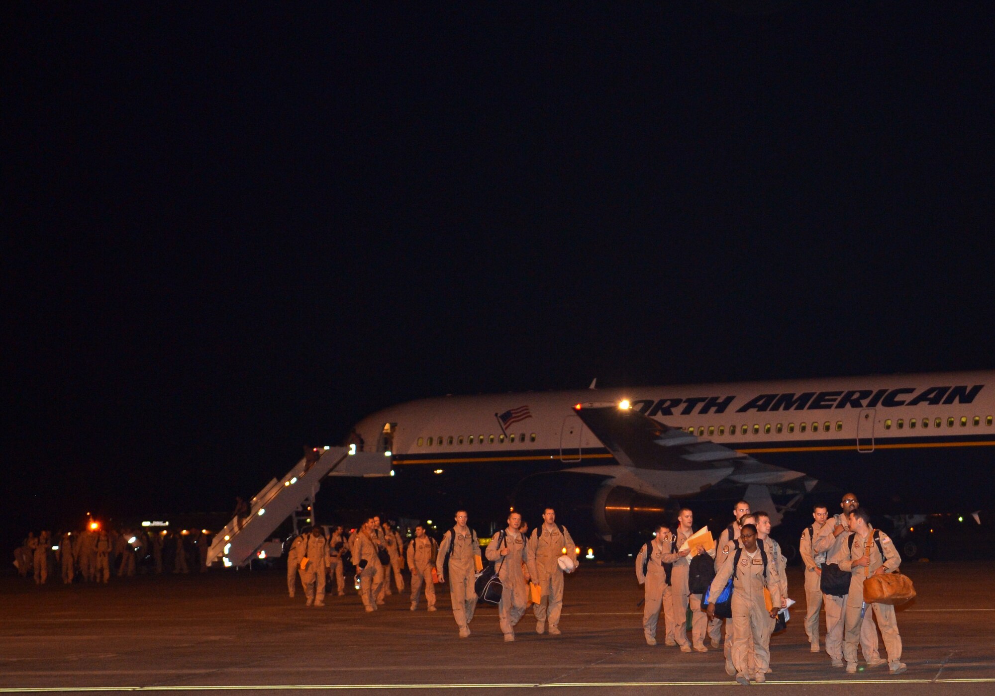 Airmen from the 4th Airlift Squadron return home June 6, 2013 at Joint Base Lewis-McChord, Wash., after a 60-deployment. (U.S. Air Force photo/Staff Sgt. Jason Truskowski)