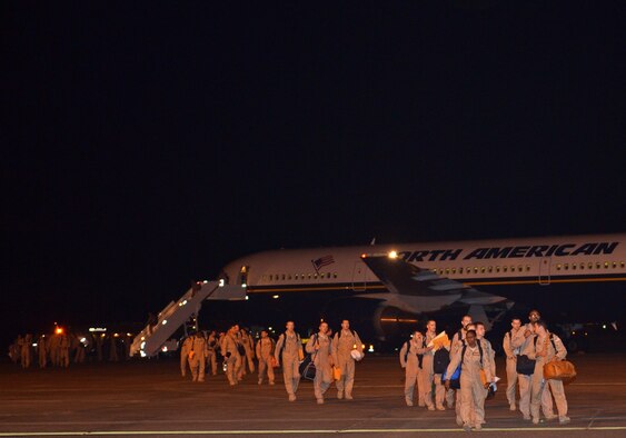 Airmen from the 4th Airlift Squadron return home June 6, 2013 at Joint Base Lewis-McChord, Wash., after a 60-deployment. (U.S. Air Force photo/Staff Sgt. Jason Truskowski)