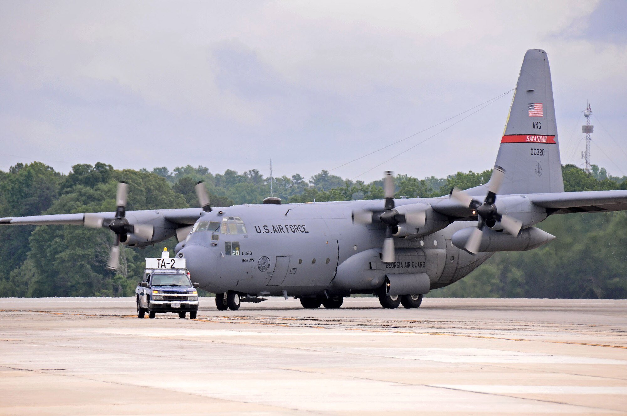 A C-130 Hercules from the 165th Airlift Wing of the Georgia Air Guard at Savannah taxis in from the runway at Dobbins Air Reserve Base, Ga., Jun 6. Three aircraft evacuated from Savannah to Dobbins to avoid the path of tropical storm Andrea as it made its way across Florida and up the east coast. (U.S. Air Force photo/Brad Fallin)
