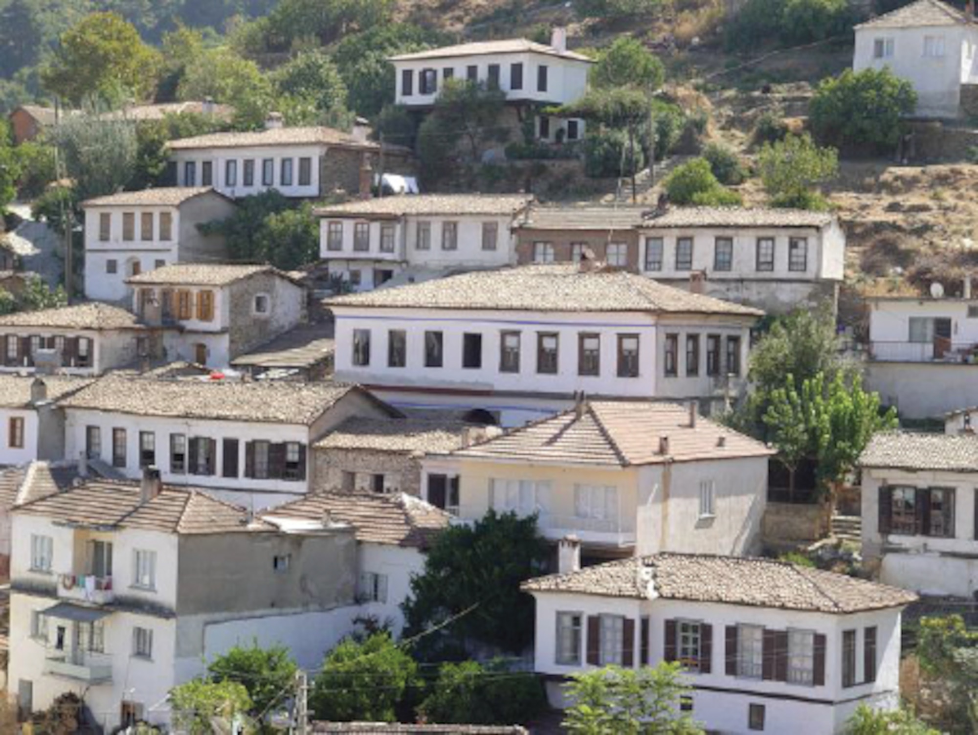 Sirince, Turkey is a quaint mountain village famous for its tradition and hospitality. While climbing the hills of Sirince, you’ll see traditional Anatolian-style houses piled up one after another on the slopes of the Selçuk Mountains. (Photo by Tanju Varlikli)