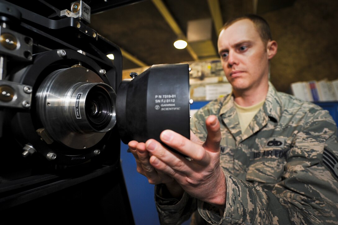 Staff Sgt. Jesse Thorn sets up a C-17 Globemaster III display unit for calibration, June 5, 2013, at the 379th Air Expeditionary Wing in Southwest Asia. This process allows technicians to adjust the airframe’s heads-up display for brightness and positional alignment. Thorn is a 379th Expeditionary Maintenance Squadron C-17 avionics technician deployed from Joint Base Lewis-McChord, Wash. (U.S. Air Force photo/Senior Airman Benjamin Stratton)