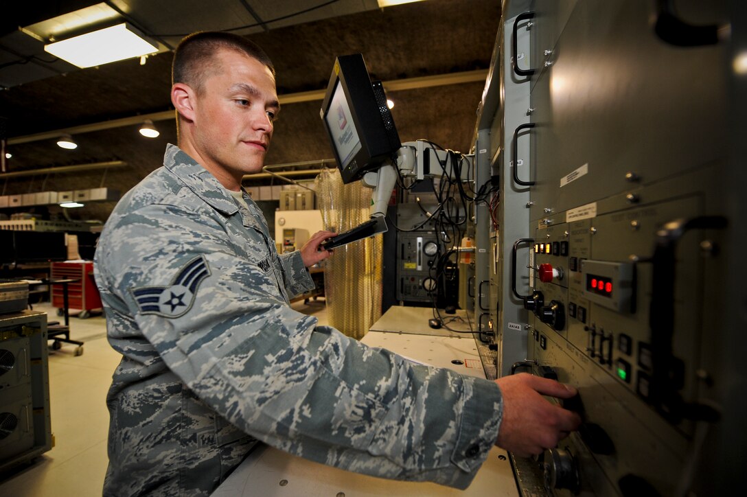 Senior Airman Scott Brosam runs a radar test station for the F-15 Strike Eagle, June 5, 2013, at the 379th Air Expeditionary Wing in Southwest Asia. The test station ensures the F-15E radar systems are working properly and mission ready. Brosam is a 379th Expeditionary Maintenance Squadron F-15 avionics technician deployed from Mountain Home Air Force Base, Idaho. (U.S. Air Force photo/Senior Airman Benjamin Stratton)