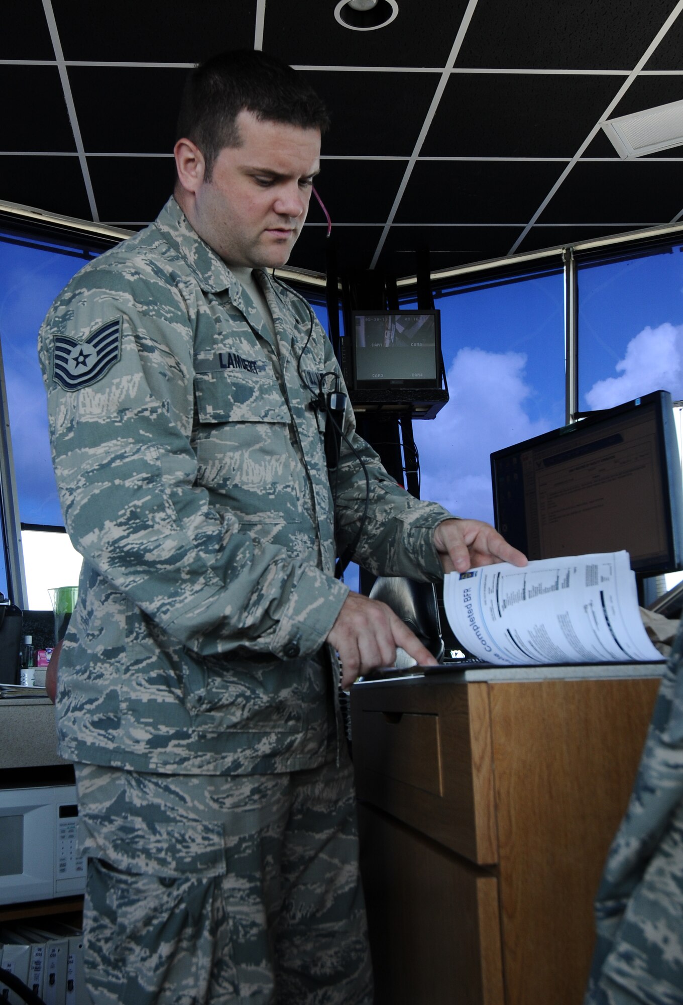 Tech. Sgt. Zachary Lambert, 36th Operations Support Squadron NCO in charge of air traffic control training, explains the flight plan for an aircraft May 30, 2013, on Andersen Air Force Base, Guam. The air traffic controllers use the flight plan to track the movements of aircraft from each checkpoint to remain aware of aircraft locations.
(U.S. Air Force photo by Airman 1st Class Emily Bradley/Released)
