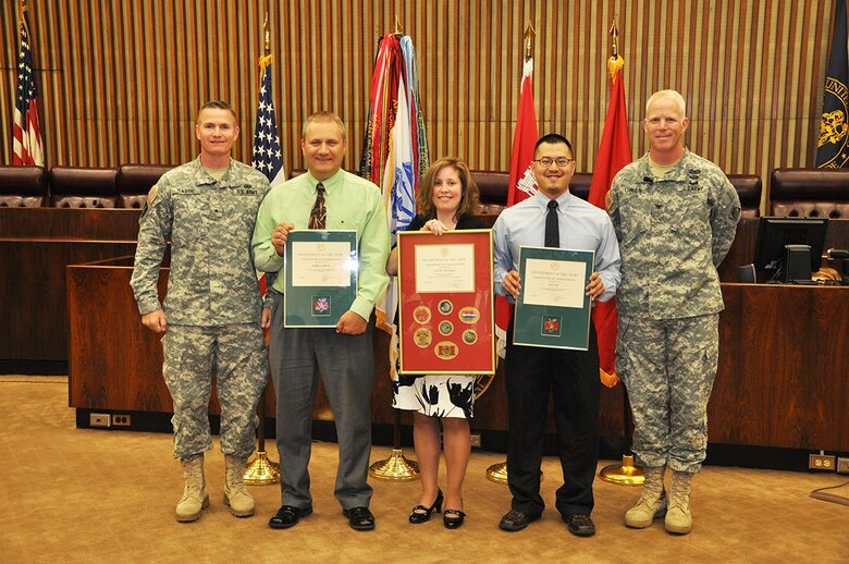 Recent graduates of the New York District Leadership Development Program and the North Atlantic Division Executive Leadership Development Program were honored during New York District's June 5, 2013 Town Hall. Pictured, l to r, North Atlantic Division Commander Brig. Gen. Kent Savre, LDP graduate Mark Jurcic, ELDP graduate Jodi McDonald, LDP graduate Jun Yan and New York District Commander Col. Paul Owen.