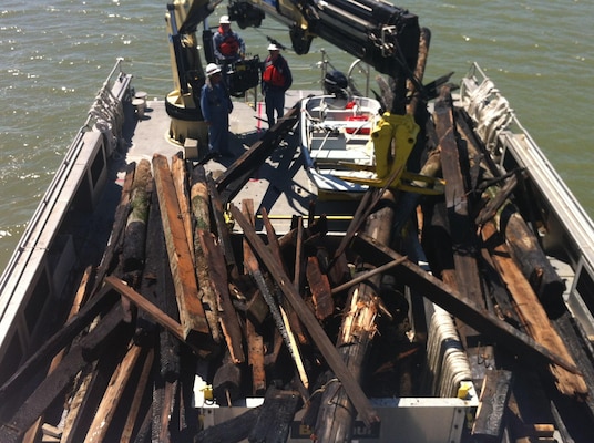 Debris on the decks of SPN debris removal vessels.