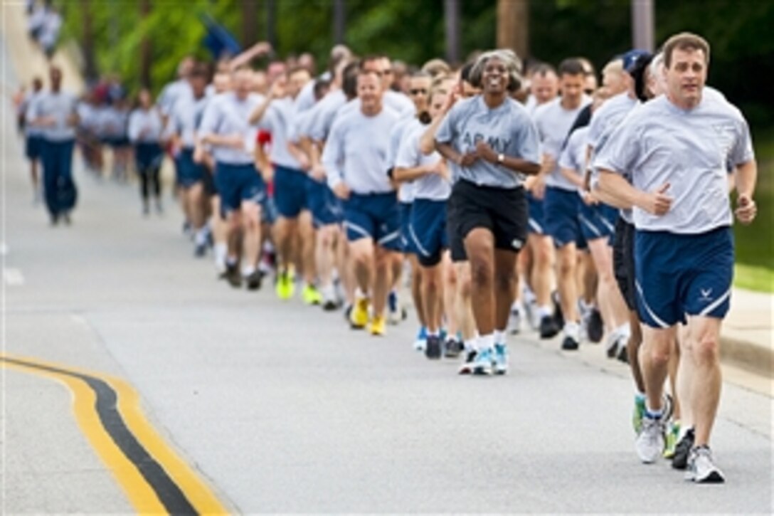 Army and Air Guardsmen participate in a D-Day memorial run on Joint Base Andrews, Md., June 6, 2013. The event was designed to build teamwork and camaraderie to mark the 69th anniversary of the Allied invasion of Western Europe during World War II. 