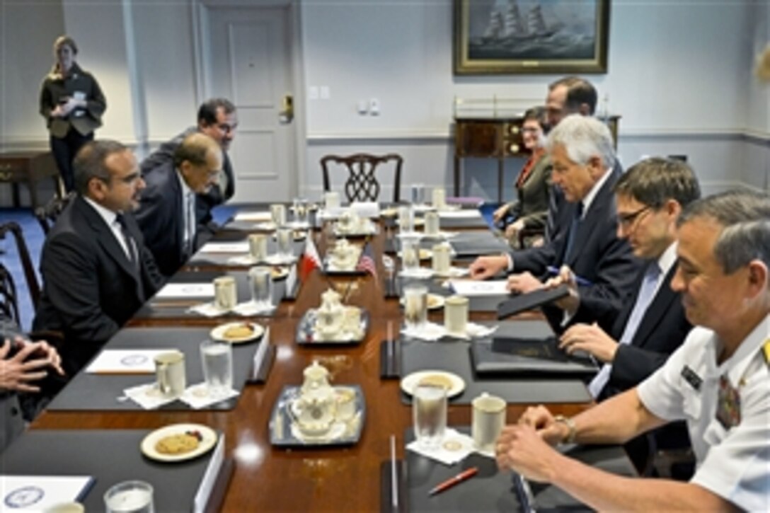 U.S. Defense Secretary Chuck Hagel, third on right, welcomes Bahraini Crown Prince Salman bin Hamad Al Khalifa, left, also the first deputy prime minister, to the Pentagon, June 7, 2013. The two leaders met to discuss matters of mutual concern.