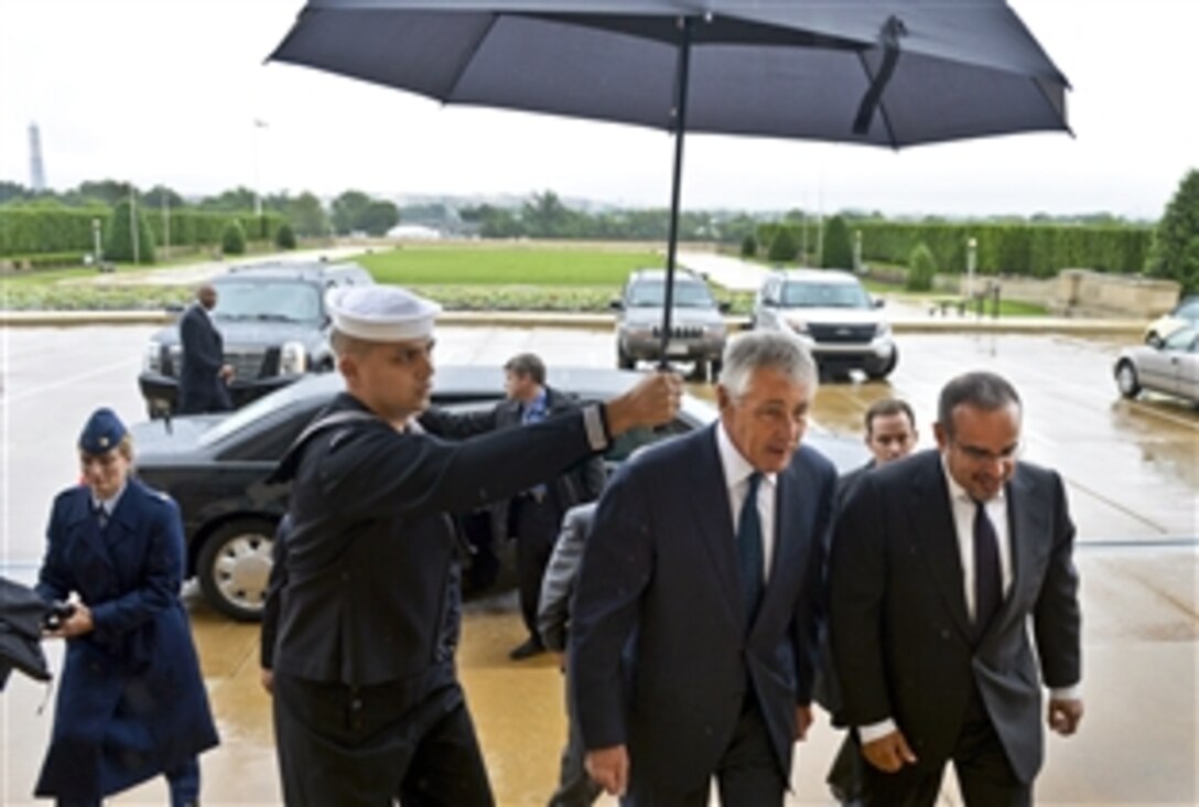 U.S. Defense Secretary Chuck Hagel, left, welcomes Bahraini Crown Prince Salman bin Hamad Al Khalifa, also first deputy prime minister, for a meeting at the Pentagon, June 7, 2013. The two leaders met to discuss issues of mutual importance.