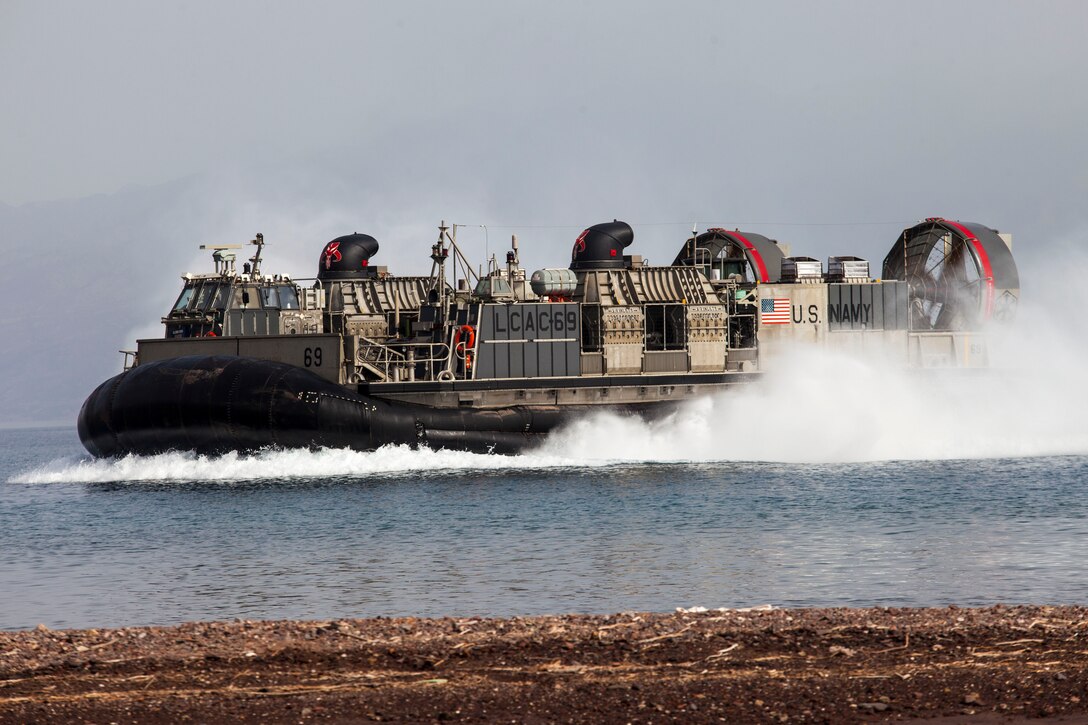 A landing craft, air cushion vessel assigned to the USS Kearsarge (LHD 3), transports light armored vehicles and Humvees assigned to the 26th Marine Expeditionary Unit (MEU), to Arta Beach in Djibouti, Africa, May 27, 2013. The 26th MEU is a Marine Air-Ground Task Force forward-deployed to the U.S. 5th Fleet area of responsibility aboard the Kearsarge Amphibious Ready Group serving as a sea-based, expeditionary crisis response force capable of conducting amphibious operations across the full range of military operations.(U.S. Marine Corps photo by Sgt. Christopher Q. Stone, 26th MEU Combat Camera/Released)