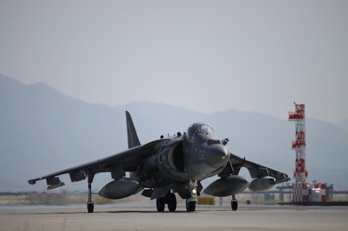 An AV-8B Harrier II aircraft from Marine Attack Squadron 513 prepares to take off from Marine Corps Air Station Iwakuni, Japan, to Kadena Air Base, Okinawa, Japan, May 24, 2013. VMA-513 conducted their last flights before their deactivation slated July 13,2013.