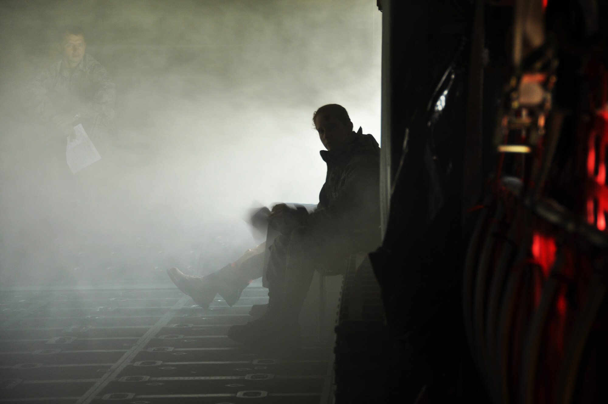 Participants playing victims of a simulated plane crash in the Mass Accident Response Exercise wait for assistance from local responders at Niagara Falls International Air Port, June 8, 2013. (U.S. Air Force photo by Staff Sgt Stephanie Clark) 
