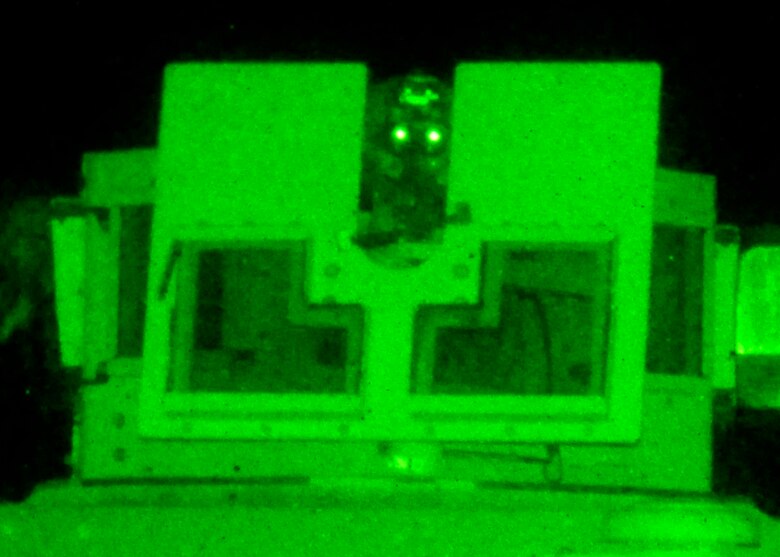 A 23rd Special Tactics Training Squadron student watches from the turret seat of a HMMWV during a counter-insurgency exercise on the Eglin Air Force Base range.  The exercise provided critical training in counter-insurgency tactics, land navigation and mission planning to potential Air Force combat controllers.  (U.S. Air Force photo/Tech. Sgt. Cheryl Foster)