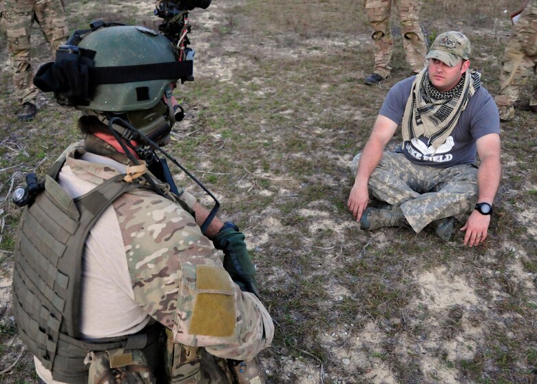 Tech. Sgt. Jon McCallum, a reservist from the 919th Special Operations Wing, acts as a role player in a counter-insurgency exercise on the Eglin Air Force Base range.   Students from the 23rd Special Tactics Training Squadron participated in the exercise that provided critical training in counter-insurgency tactics, land navigation and mission planning to potential Air Force combat controllers.(U.S. Air Force photo/Tech. Sgt. Cheryl Foster)