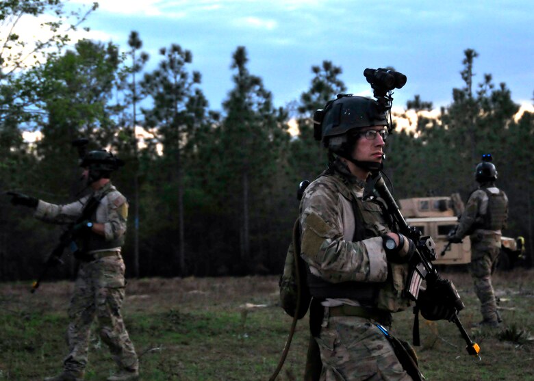 Students from the 23rd Special Tactics Training Squadron secure the area during an exercise on the Eglin Air Force Base range. The exercise provided critical training in counter-insurgency tactics, land navigation and mission planning to potential Air Force combat controllers.  (U.S. Air Force photo/Tech. Sgt. Cheryl Foster)