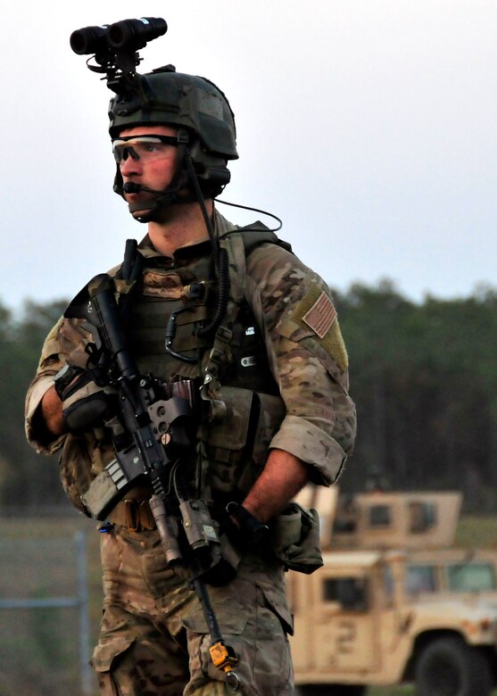 A student from the 23rd Special Tactics Training Squadron secures the area during an exercise on the Eglin Air Force Base range. The exercise provided critical training in counter-insurgency tactics, land navigation and mission planning to potential Air Force combat controllers.  (U.S. Air Force photo/Tech. Sgt. Cheryl Foster)