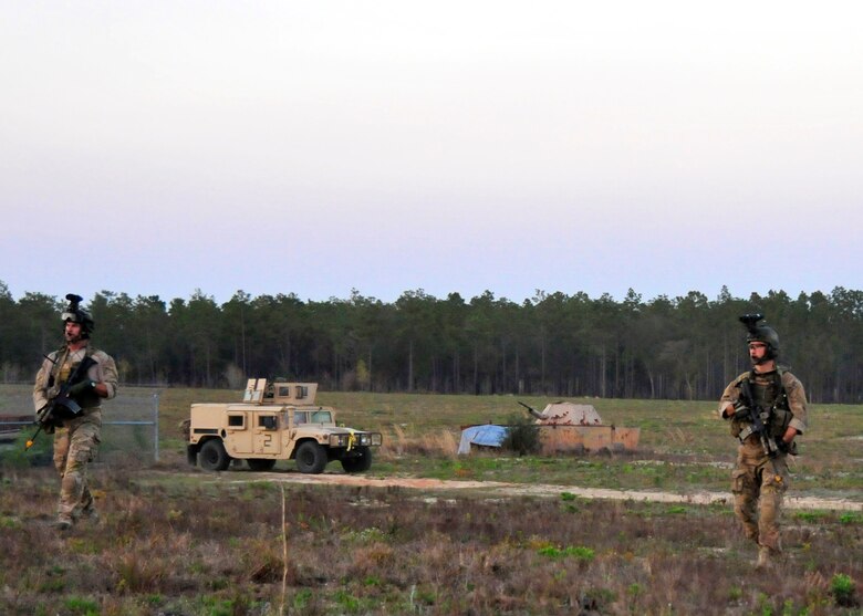 Students from the 23rd Special Tactics Training Squadron move in toward their objective during an exercise on the Eglin Air Force Base range.  The exercise provided critical training in counter-insurgency tactics, land navigation and mission planning to potential Air Force combat controllers.  (U.S. Air Force photo/Tech. Sgt. Cheryl Foster)