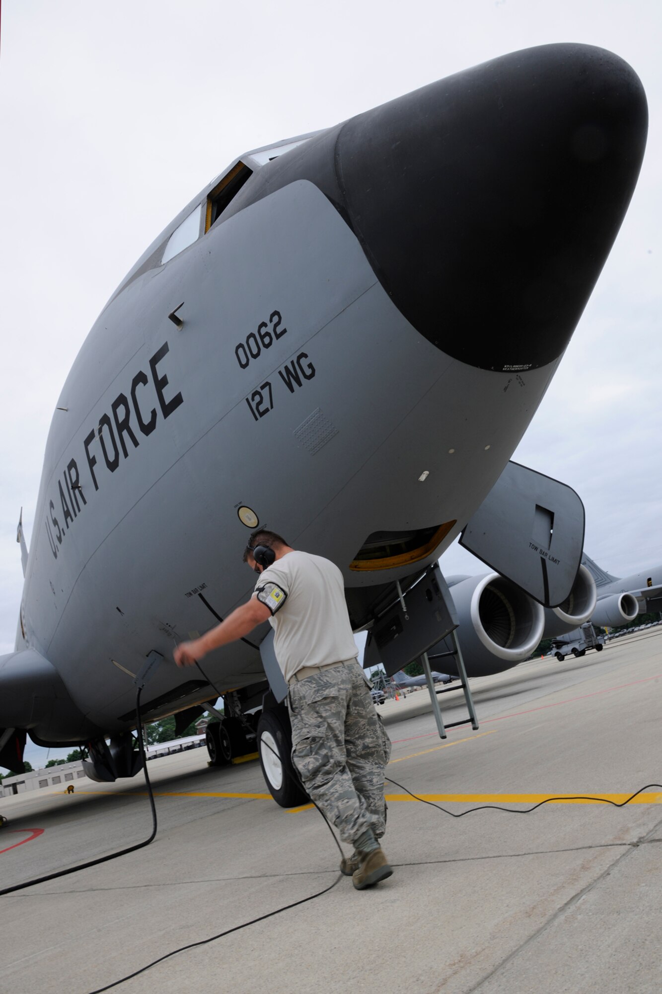 Crew Chief SSgt Williams Bowers from the 191st Aircraft Maintenance Squadron performs a routine maintenance inspection on a KC-135 Stratotanker while engines are running at Selfridge Air National Guard Base, Mich., June 8, 2013. Bowers was pleased to report that the inspection showed the --C135 to be in perfect working order. (U.S. Air National Guard photo by TSgt. David Kujawa) (Released)