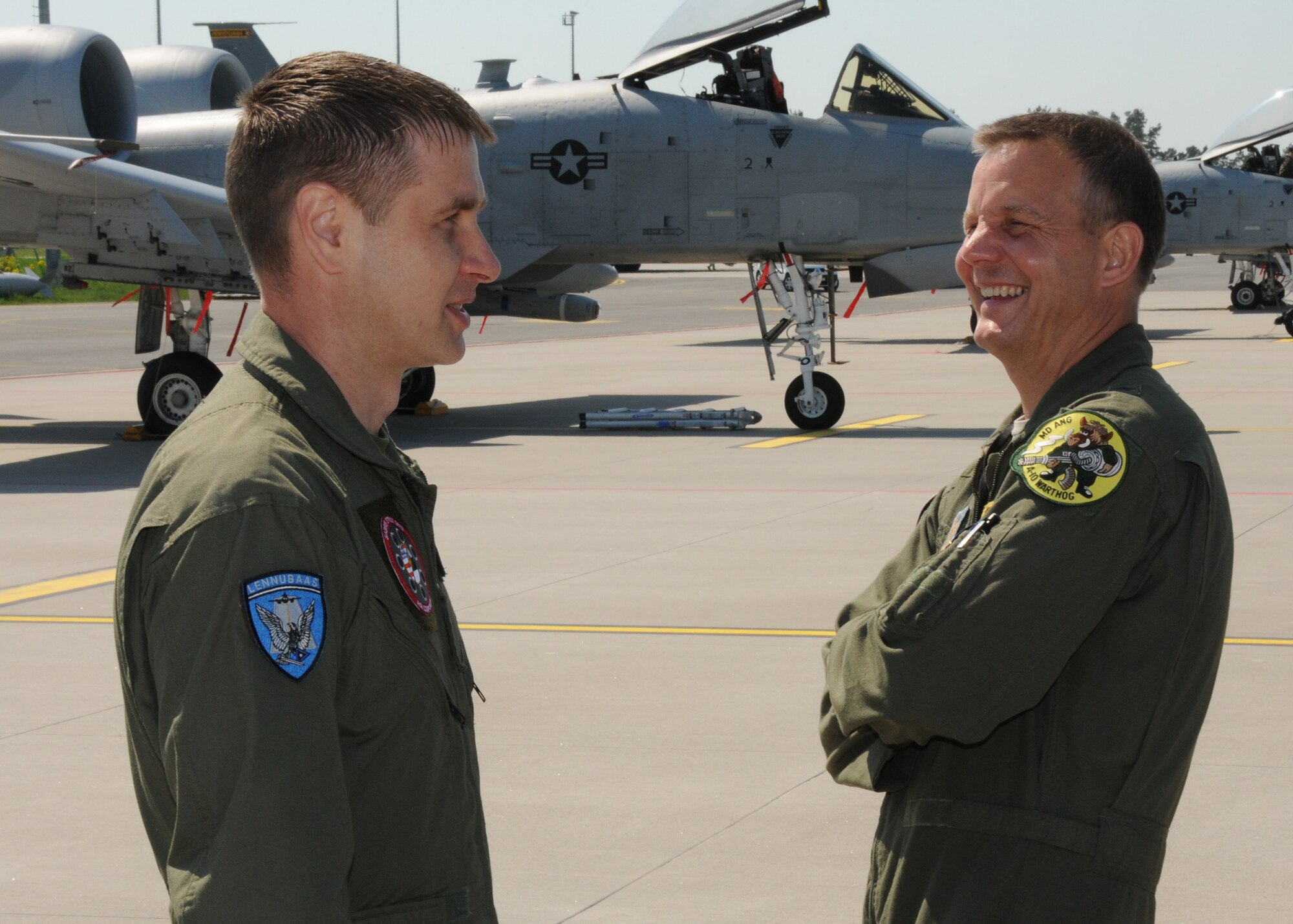 U.S. Air Force Brig. Gen. Scott Kelly, Commander 175th Wing, Maryland Air National Guard, speaks with Lt. Col. Rauno Sirk, Estonian Air Base Commander, at Amari Air Base, Estonia during Saber Strike, June 5, 2013. Saber Strike 2013 is a multinational exercise involving approximately 2,000 personnel from 14 countries and is designed to improve NATO interoperability and strengthen the relationships between military forces of the U.S., Estonia and other participating nations. (U.S. Air National Guard photo by Lt. Col. James Doyle)