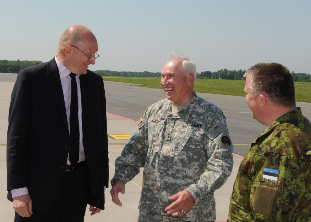 U.S. Army Maj. Gen. James Adkins, the Adjutant General for the Maryland National Guard, speaks with Estonian Minister of Education, Jaak Aaviksoo and Brig. Gen. Meelis Kiili, Commander of the Estonia Defense League, June 5, 2013, while on a tour of Amari Air Base, Estonia during Saber Strike. Gen. Adkins traveled to Estonia to celebrate 20th anniversary of the state partnership program between the Estonian Military and the Maryland National Guard.  Saber Strike 2013 is a U.S. Army Europe-led, multinational, tactical field training and command post exercise occurring in Lithuania, Latvia and Estonia June 3-14 that involves more than 2,000 personnel from 14 different countries. The exercise trains participants on command and control as well as interoperability with regional partners and is designed to improve  joint, multinational capability in a variety of missions and to prepare participants to support multinational contingency operations worldwide. (U.S. Air National Guard photo by Lt. Col. James Doyle)