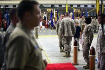 Col. Jeffrey M. Reagan (center), the former chief of staff for 2nd MLG, requests to “go ashore” to Brig. Gen. Edward D. Banta (center facing away), the commanding general of 2nd Marine Logistics Group, during a retirement ceremony at 2nd Maintenance Battalion’s maintenance bay aboard Camp Lejeune, N.C., June 7, 2013. Reagan received the Piping Ashore ceremony. “Piping Ashore” is a historical and traditional naval ceremony that began in the 1700s, and is reserved for officers or enlisted service members who completed a career in the Marine Corps or Navy serving the highest traditions in the naval service.