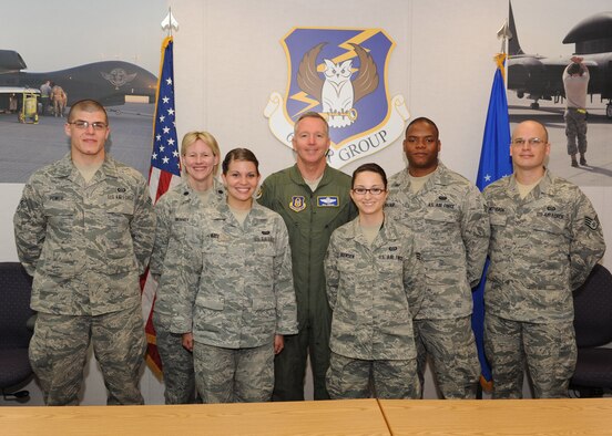 These members received coins from Maj Gen Bill Binger from for their participation in standing up the newest ISR group. From left to right are: Senior Airman Steven Power, Lt. Col. Audrey Swinney, Senior Airman Laura Vance, Maj. Gen. Binger, Senior Airman Sharlota Sorenson, Senior Airman Joshua Walker and Staff Sgt. Eli McPheron. (U.S. Air Force photo/Staff Sgt. Veronica A. Pierce)
